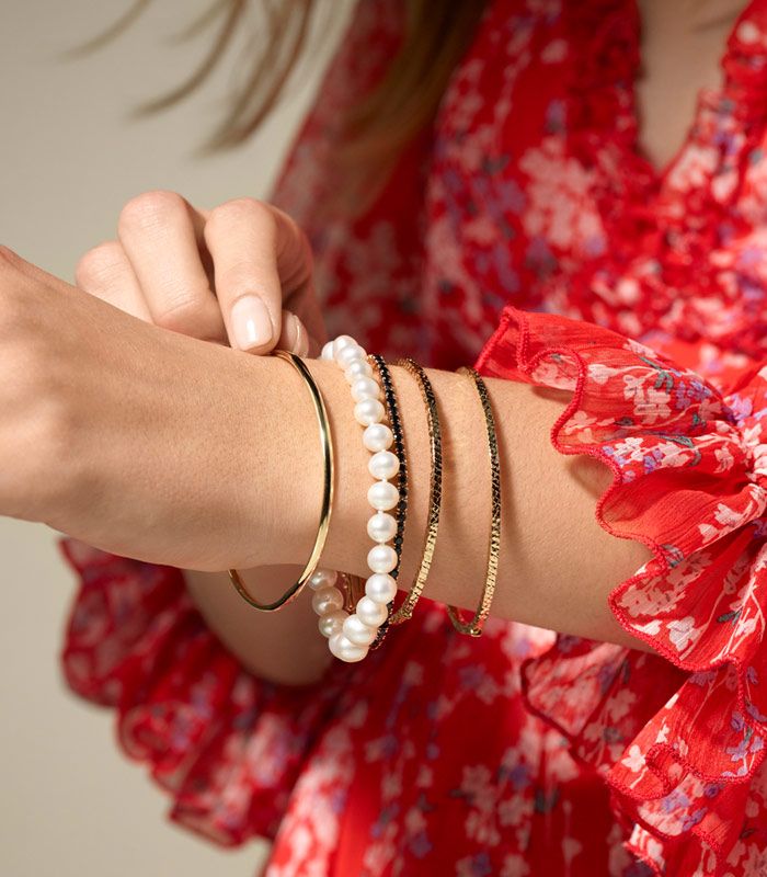 Woman Wearing Stacked Bracelets